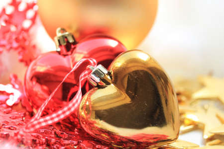 Group of red and golden christmas decorations, heart shapeの写真素材