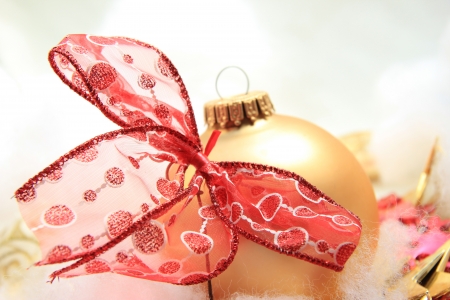 Christmas ornaments in red and gold: ornament and a bowの写真素材