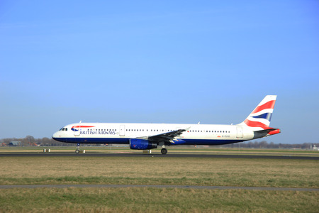 March, 22nd 2015, Amsterdam Schiphol Airport G-EUXD British Airways Airbus A321-231 take off from Polderbaan Runwayのeditorial素材