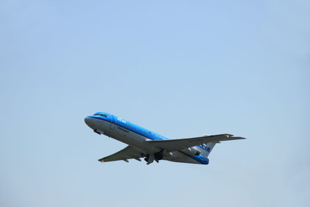 Amsterdam, The Netherlands - June 12 2015: PH-KZR KLM Cityhopper Fokker F70 takes off at Amsterdam...