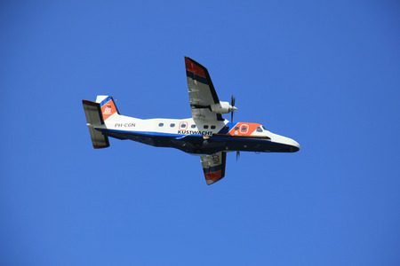 Velsen, the Netherlands - May 6th 2016: PH-CGN The Netherlands Coastguard Dornier , in flight over North Sea Canalのeditorial素材
