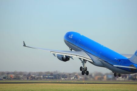 Amsterdam, the Netherlands  - November 25th, 2016: PH-AKE KLM Royal Dutch Airlines Airbus A330 taking off from Polderbaan Runway at Amsterdam Airport Schipholのeditorial素材