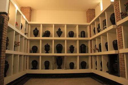 Urns with ashes in a columbarium wallの写真素材