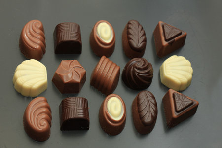 Luxurious chocolates in various shapes and colors