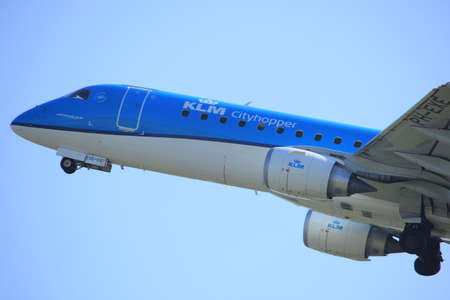 Amsterdam the Netherlands - April 2nd, 2017: PH-EXE KLM Cityhopper Embraer ERJ-190STD takeoff from Polderbaan runway, Amsterdam Airport Schipholのeditorial素材