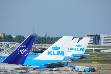 Amsterdam The Netherlands -  May 26th 2017: Planes of several major airlines parked at the gates at Schiphol Amsterdam International Airportのeditorial素材