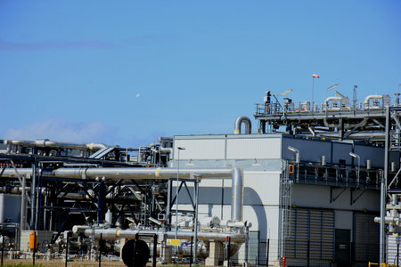 Silos and heavy metal pipes of an industrial plant, Chemical industrial industry