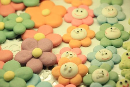 Pastel sugar candy on display in a pastry bakers shopの写真素材