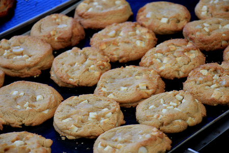 Fresh made luxurious cookies on display on a market scale