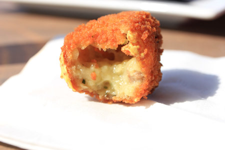 Dutch Bitterbal warm stuffed fried meatbal, served in the Netherlands with mustard