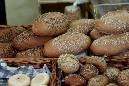 Various sorts of artisanal bread at a market
