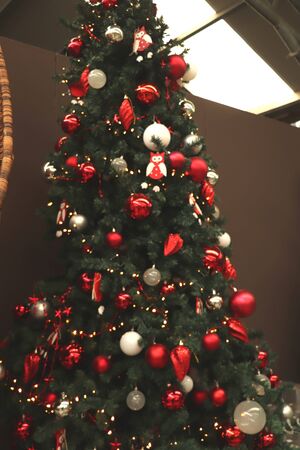 Aalsmeer, the Netherlands - November 7th 2018: Decorated Christmas tree in an interior decoration shopのeditorial素材