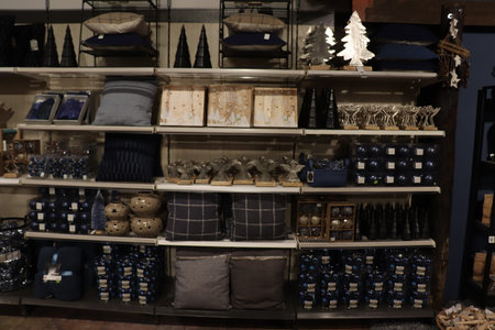 Cruquius, the Netherlands - October 26th 2018: Christmas decorations and accessoiries in blue and wood in an interior decoration shopのeditorial素材