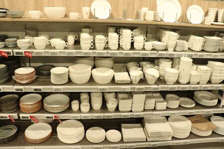 Beverwijk, the Netherlands - october 26th 2018: White crockery on display in an interion decoration shopのeditorial素材