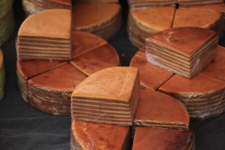 Fresh baked spekkoek, a traditional Indonesian layer cake, made of egg yolks, butter and sugar
