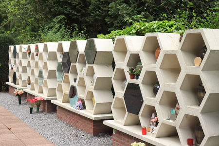 Urns with ashes in a columbarium wall, outside a crematoriumのeditorial素材
