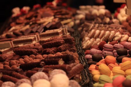 Chocolate pralines in different colors and shapes at a market in Barcelona, Spainの写真素材