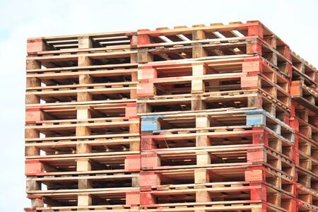 Stacked wooden pallets at a pallet storage
