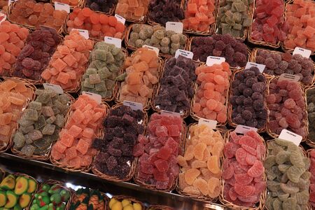 Candied fruit in various shapes, flavors and colors for sale on a Spanish marketの写真素材