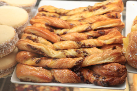 Fresh made cinnamon rolls on display in a shop window