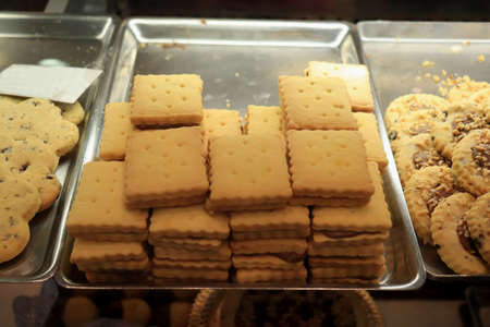 Various biscuits with nuts and chocolates in an Italian shopの写真素材