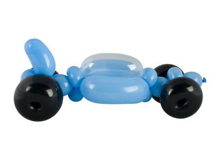 Twisted balloon race car isolated on whiteの写真素材