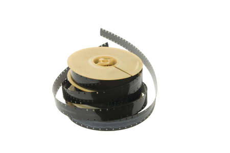 Old film reels with film Isolated on whiteの写真素材