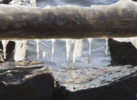 Ice encrusted ship tie linesの写真素材