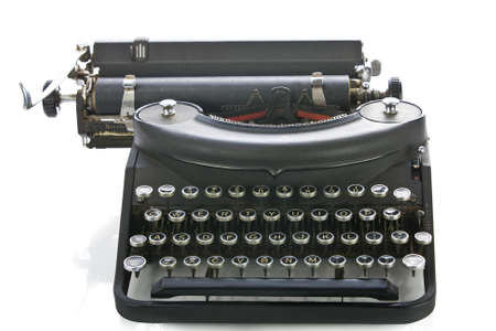 Vintage portable typewriter on white  の写真素材