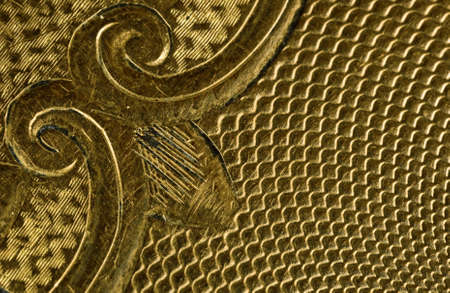 Highly detailed background carved in gold 
