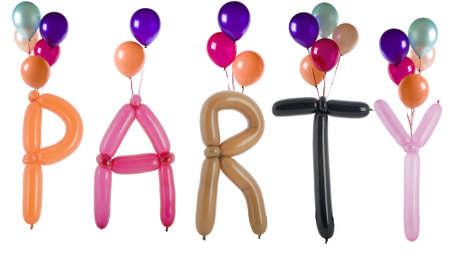 Party spelled out with balloons isolated on whiteの写真素材