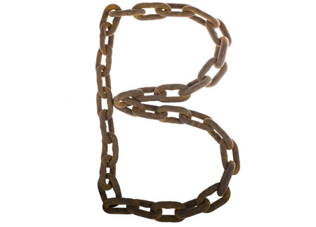 Letter B from rusty chain alphabet isolated on white  