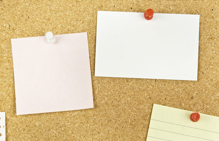 Cork bulletin board with notes  