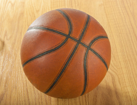 Basketball ball on wood floorの写真素材