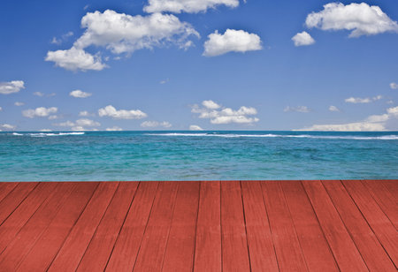 Big deck going out to tropical beach