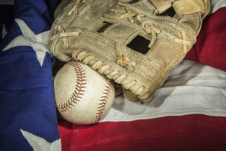 major league baseball with American flag and gloveの写真素材