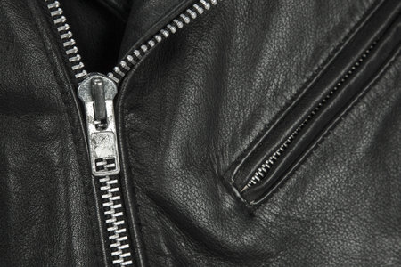 close-up of black leather jacket detailsの写真素材