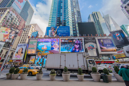 NEW YORK CITY, NY -Jan 9 2011: Times Square is featured with Broadway Theaters and LED signs as a...