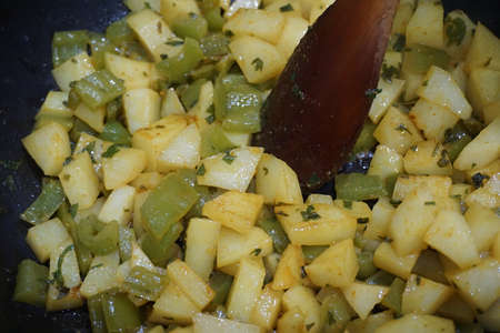 Homemade potatoes with Green Pepper Moroccan Traditional Dishの写真素材