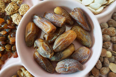 Mix Date and dried fruit on  traditional table,Islamic occasion healthy eating delicious, diet.の写真素材