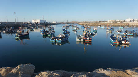 Fishing boats in the port of Essaouira, Moroccoの写真素材