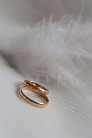 Wedding rings on white backgroundの写真素材