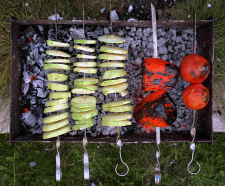 Vegetables on skewers cooked over the grillの写真素材