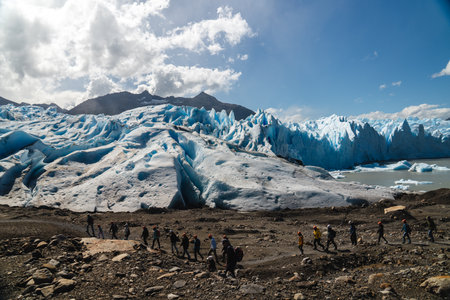 People are walking on top of the Perito Moreno glacier in Argentine Patagonia.の写真素材