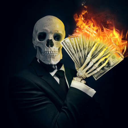 An art illustration of a skeleton in a business suit with a cash in hand burning. A concept about...