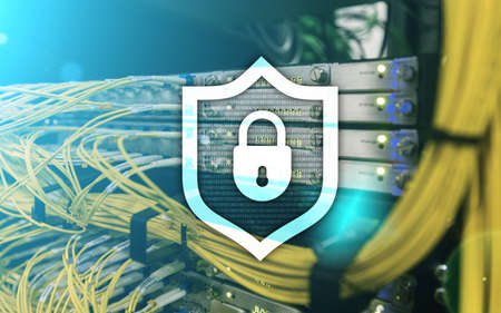 Cyber protection shield icon on server room background. Information Security and virus detection.の写真素材