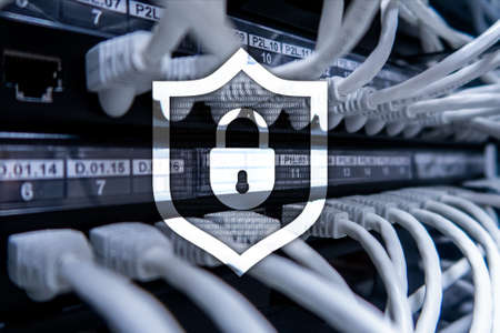 Cyber protection shield icon on server room background. Information Security and virus detection.の写真素材