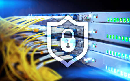 Cyber protection shield icon on server room background. Information Security and virus detection.の写真素材