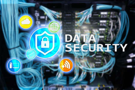 Data security, cyber crime prevention, Digital information protection. Lock icons and server room background.の写真素材