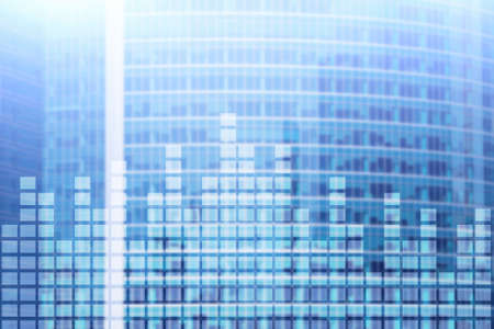 Financial chart on blurred skyscraper office background.の写真素材
